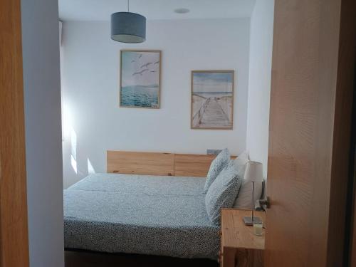 Posteľ alebo postele v izbe v ubytovaní Ocean View Malpica VUT