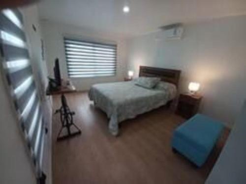 Katil atau katil-katil dalam bilik di Linda casa en yumbel