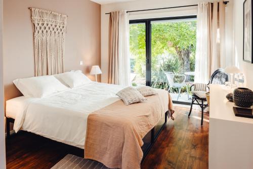 Postel nebo postele na pokoji v ubytování Casa Boho - Turismo Rural