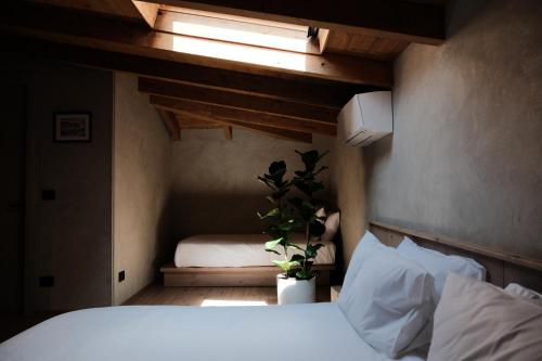 Ένα ή περισσότερα κρεβάτια σε δωμάτιο στο Faces & Places Boutique Hotel