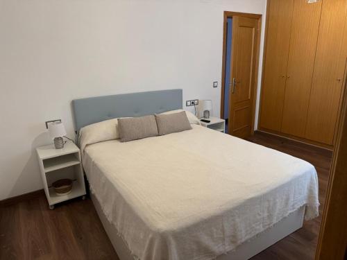 Letto o letti in una camera di Casa Emma
