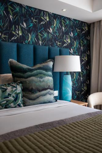 Katil atau katil-katil dalam bilik di Le Petit Manoir Boutique Hotel