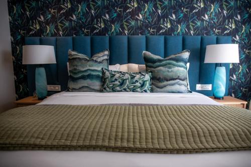 Katil atau katil-katil dalam bilik di Le Petit Manoir Boutique Hotel