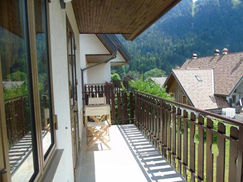 a balcony with a view of a mountain at Appartamento Nicole in Ravascletto