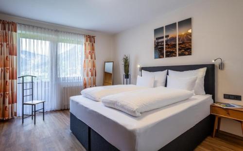 Postel nebo postele na pokoji v ubytování Marios Appartement