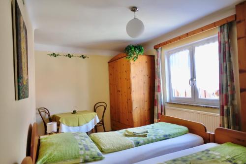 Postel nebo postele na pokoji v ubytování Haus Steinmetz