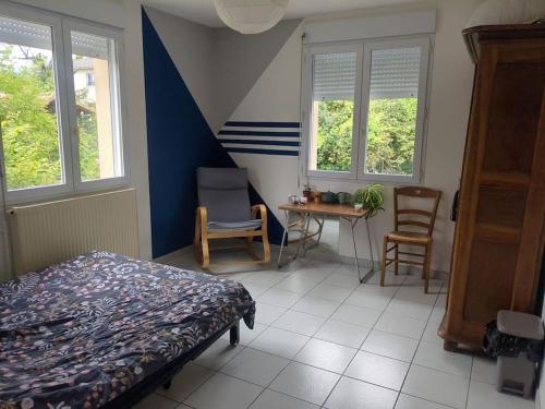 Ένα ή περισσότερα κρεβάτια σε δωμάτιο στο maison familiale Gap