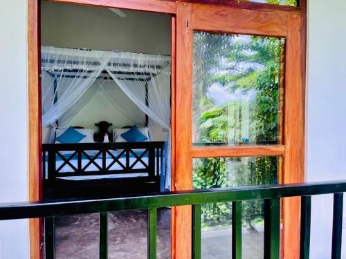 Balkón nebo terasa v ubytování Paddy Green Villa Unawatuna Close by Sri yoga shala