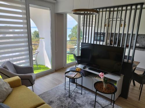 Zona de estar de Silver Harmony Apartman Siófok