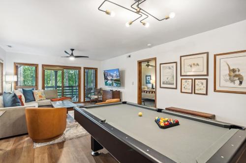 a living room with a pool table at Wycham Place in Boone