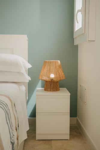 Postel nebo postele na pokoji v ubytování Natoli Beach House & Villas - Villa Giorgia
