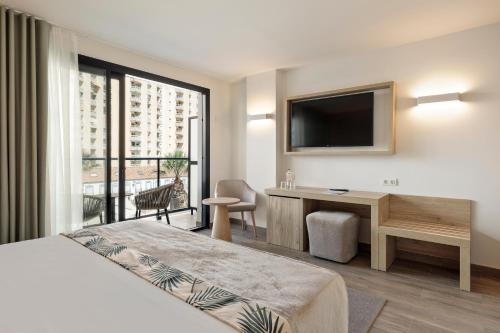 Katil atau katil-katil dalam bilik di Hotel Best Triton