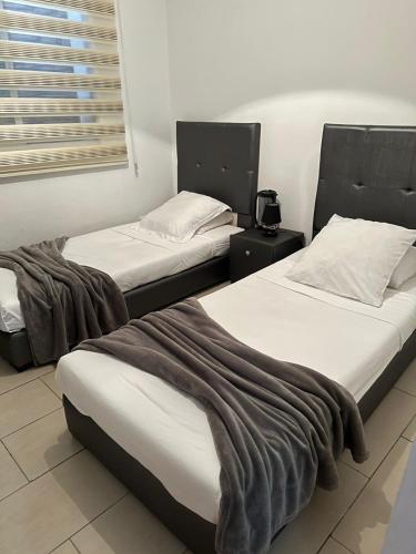 Katil atau katil-katil dalam bilik di Luxury appartement