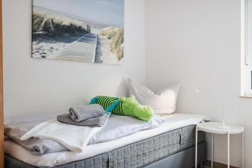Cama o camas de una habitación en Strandnah