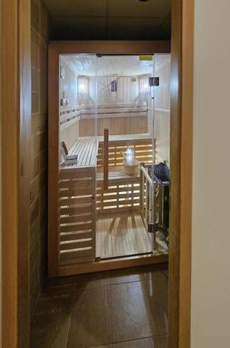 a view of a kitchen through a glass door at Hotel Apartamento Marouco in A Guarda