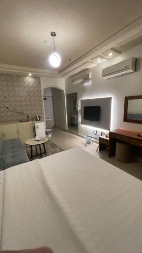 Llit o llits en una habitació de Arkan Dareen