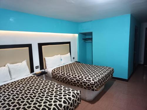 Кровать или кровати в номере Hotel Essen's