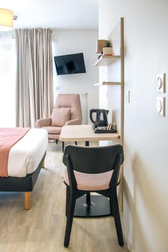 Ένα ή περισσότερα κρεβάτια σε δωμάτιο στο Twenty Business Flats Lille - Bayard