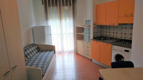 A kitchen or kitchenette at Condominio Simma 2