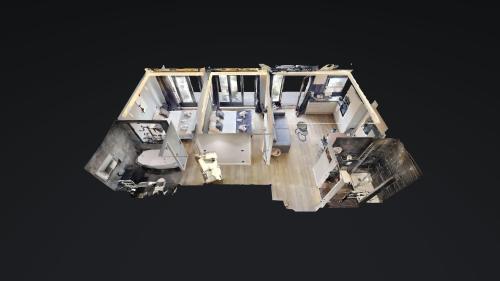 - une vue de tête sur une maison avec plan d'étage dans l'établissement Bluestay 54 - Superbe appartement à Paris, à Paris