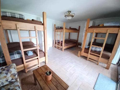 Ένα ή περισσότερα κρεβάτια σε δωμάτιο στο Hostel Mochiliers Bed and Breakfast