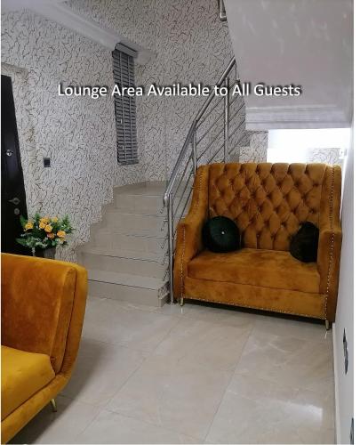 Posezení v ubytování Cozy Suites
