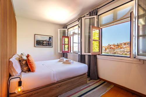 Postel nebo postele na pokoji v ubytování NorteSoul Porto à Vista