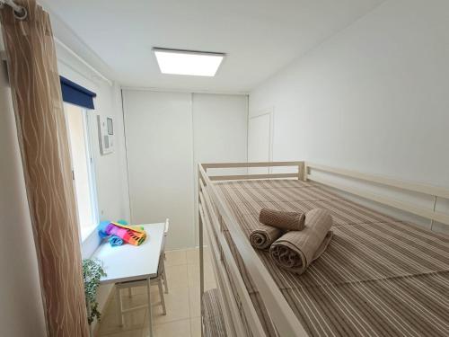 Cama o camas de una habitación en Eccellente appartamento in posizione strategica