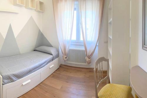 Cama o camas de una habitación en MilleStorie House Rome