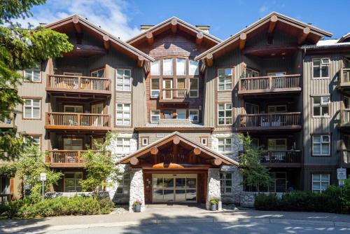a large apartment building with a lot of windows at Lost Lake Lodge by Whistler Premier in Whistler