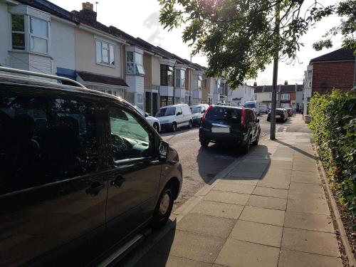 a car parked on the side of a street at Portsmouth House near Centre 3 Bedrooms in Portsmouth