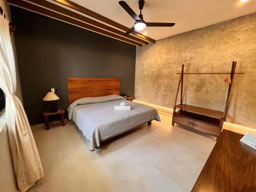 Ein Bett oder Betten in einem Zimmer der Unterkunft Hotel Palmeras