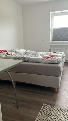 Una cama o camas en una habitación de Motel Munsch