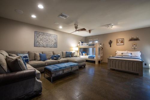 a large living room with a couch and a table at North Scottsdale on 70th in Carefree