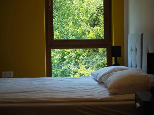Postel nebo postele na pokoji v ubytování Wilczy Apartament
