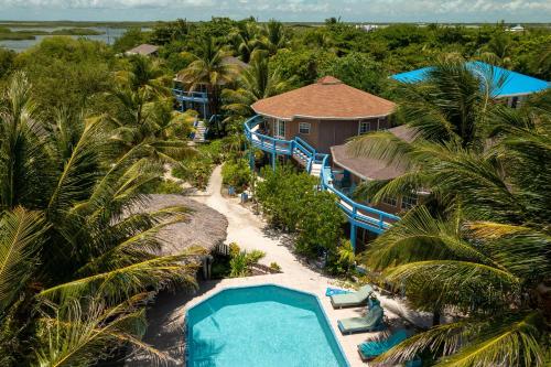 an aerial view of a resort with a swimming pool at White Sands Cove G04- Partial Ocean View 1 BR by Stay Floreo in San Pedro