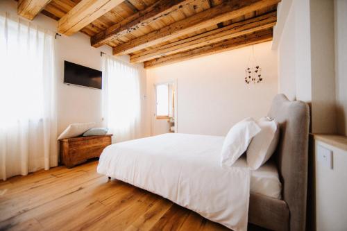 Una cama o camas en una habitación de Casa Callonga