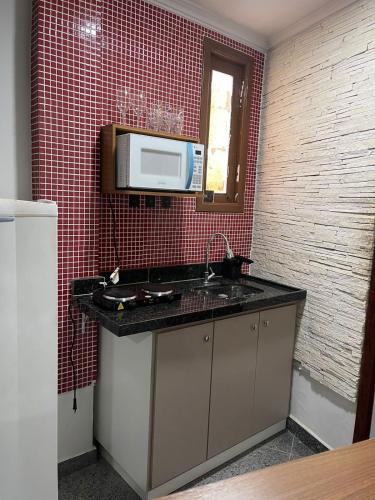 Kuchyň nebo kuchyňský kout v ubytování Loft Moderno no Centro