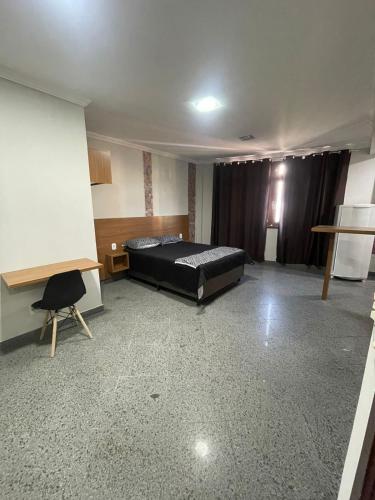 Postel nebo postele na pokoji v ubytování Loft Moderno no Centro