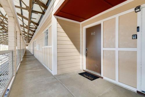 a hallway of a building with a garage door at Amazing pool, Steps 2 Broadway right on the Riverfront! in Nashville