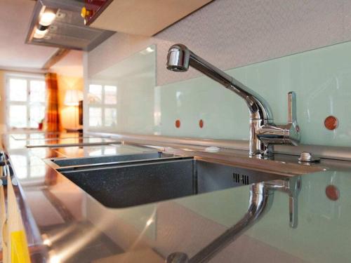 a kitchen counter with a sink in a kitchen at Holiday apartment sunshine in Quedlinburg