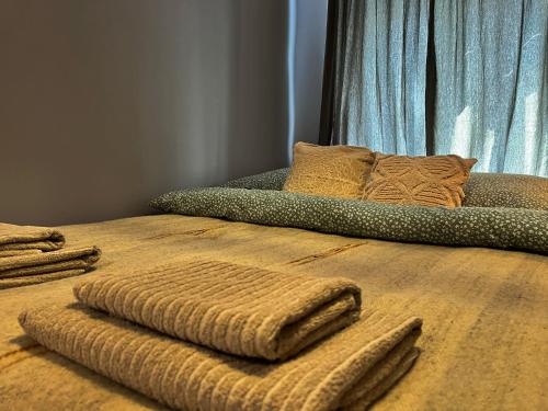 Postel nebo postele na pokoji v ubytování Apartament Sudeckie Boho