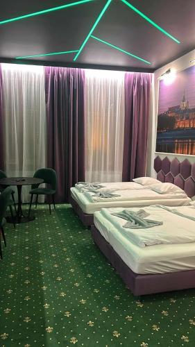 Ένα ή περισσότερα κρεβάτια σε δωμάτιο στο Quick Trip Apartments Toruń