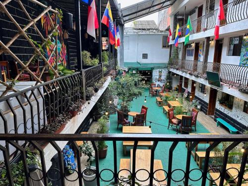 a view from a balcony of a building with a pool at El Jardín Escondido by Soma in Baños