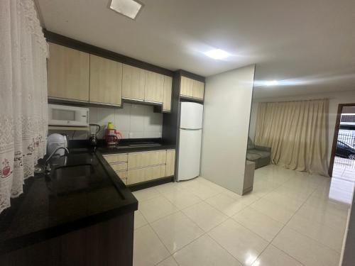 Η κουζίνα ή μικρή κουζίνα στο Lar oliveiras, próximo cento, 500 metros de clube pinheiros