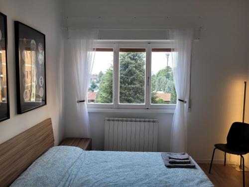 Ένα ή περισσότερα κρεβάτια σε δωμάτιο στο The Comfort Zone Milano MXP