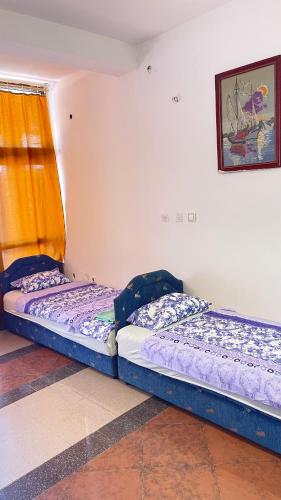 Katil atau katil-katil dalam bilik di Hostel flash ulcinj
