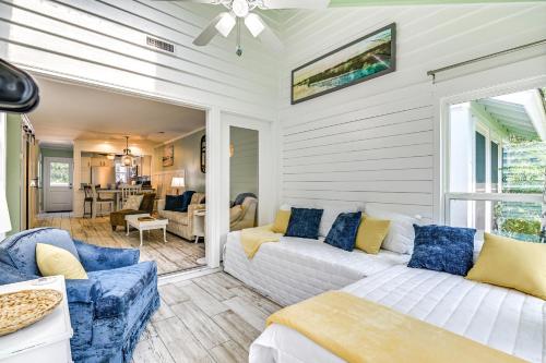 a living room with a bed and a couch at Chic Murrells Inlet Getaway about 2 Mi to Marsh Walk! in Myrtle Beach
