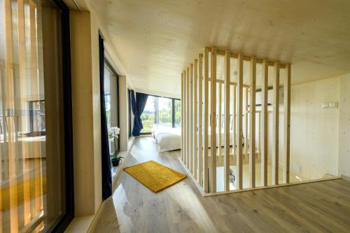 Ένα ή περισσότερα κρεβάτια σε δωμάτιο στο EstBerg Riverside Holiday Home