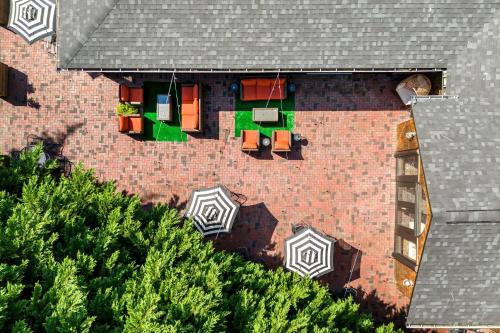 an aerial view of a house with a roof at Peri Social House in Black Mountain